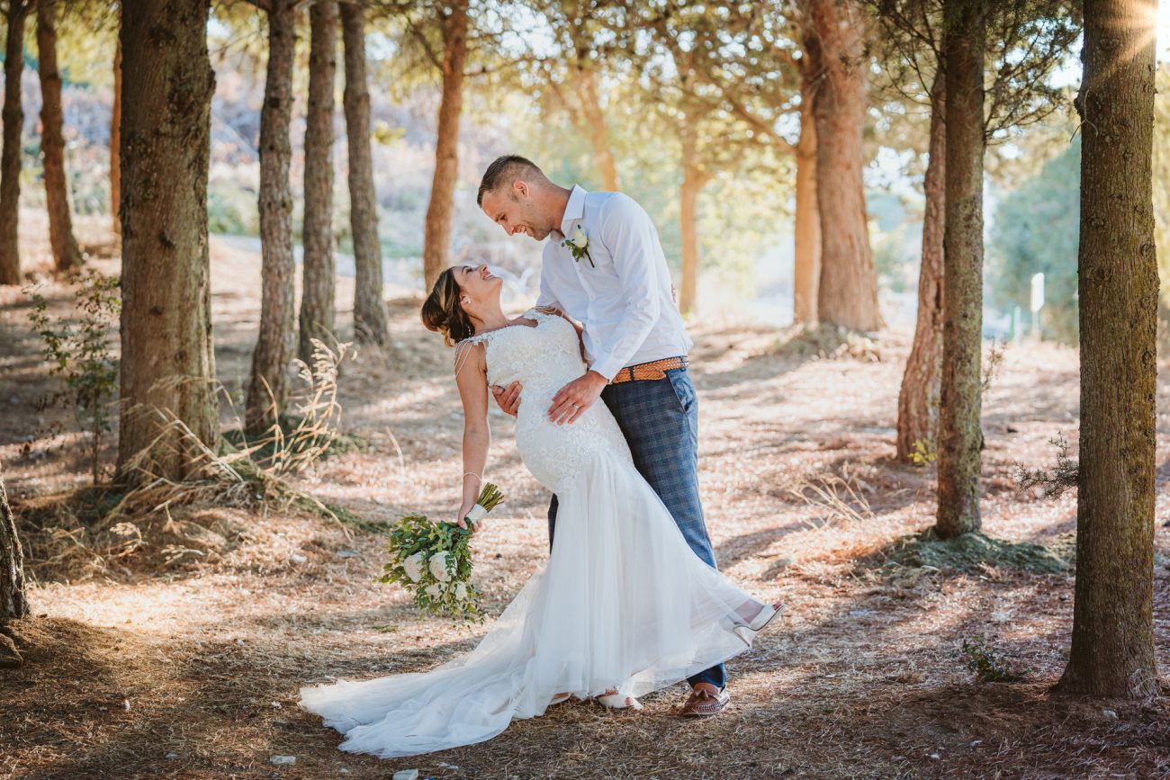 Discover how Ellie and Jack's ethereal, romantic Cyprus wedding unfolded, captured magically moment by moment by us, their Minthis Hills wedding photographer.