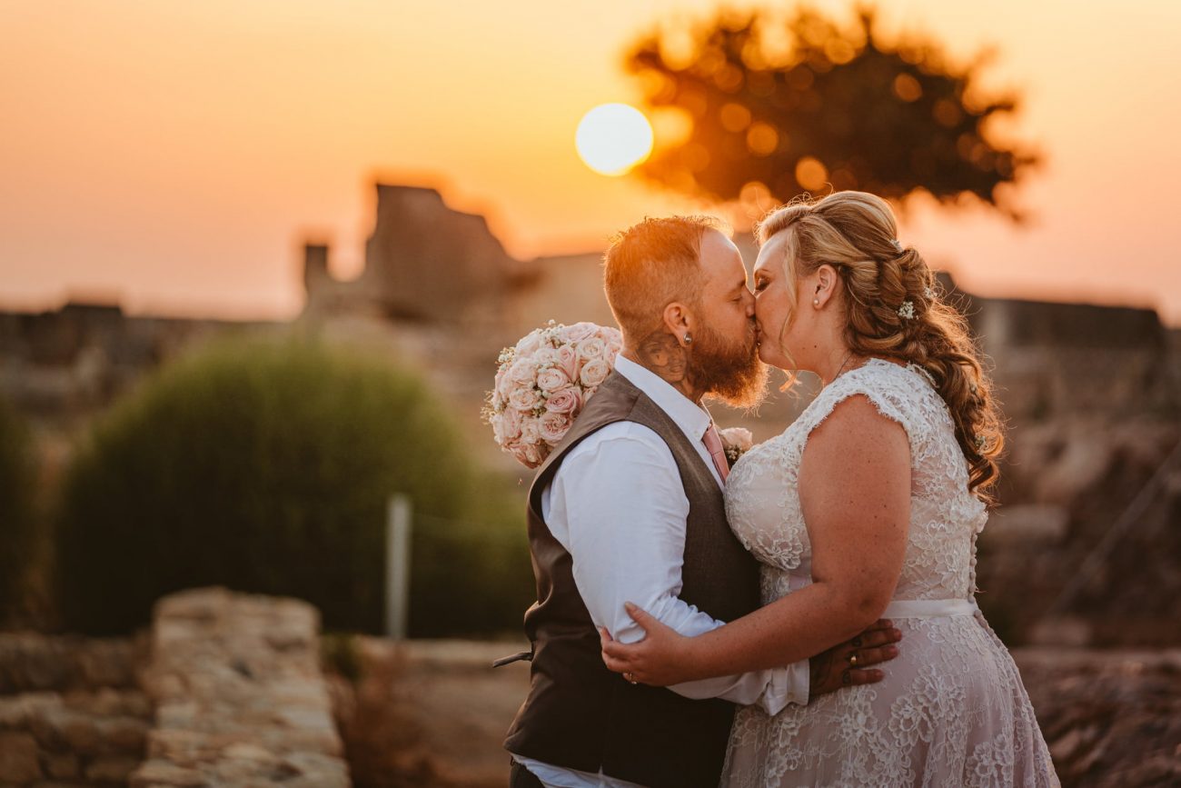 Fall feet first for Jess and Andy's Liopetro wedding in Cyprus, filled with sizzling sunsets and romantic smoke flares, captured by Kouklia wedding photographer