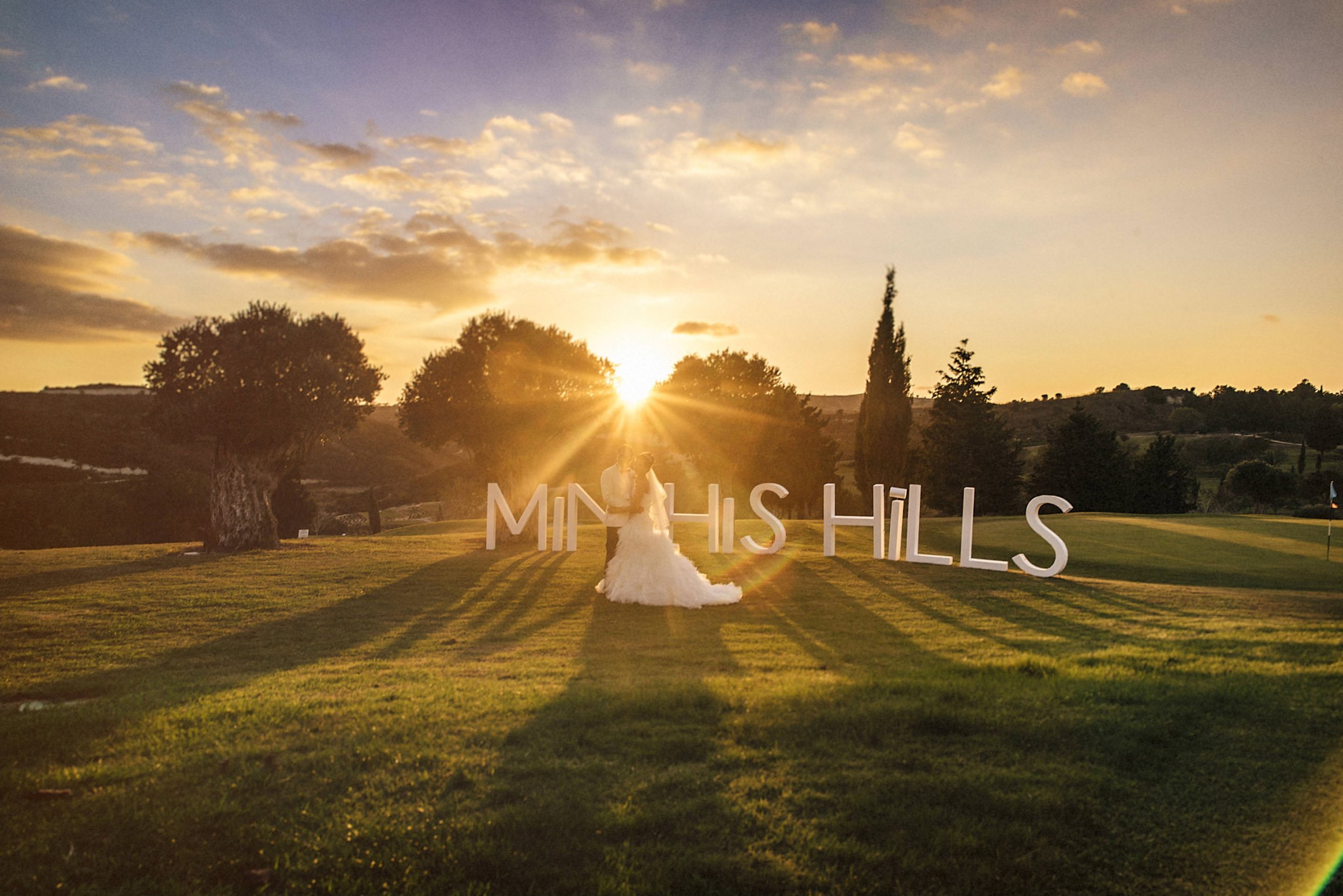 sign bride groom sunset minthis hills