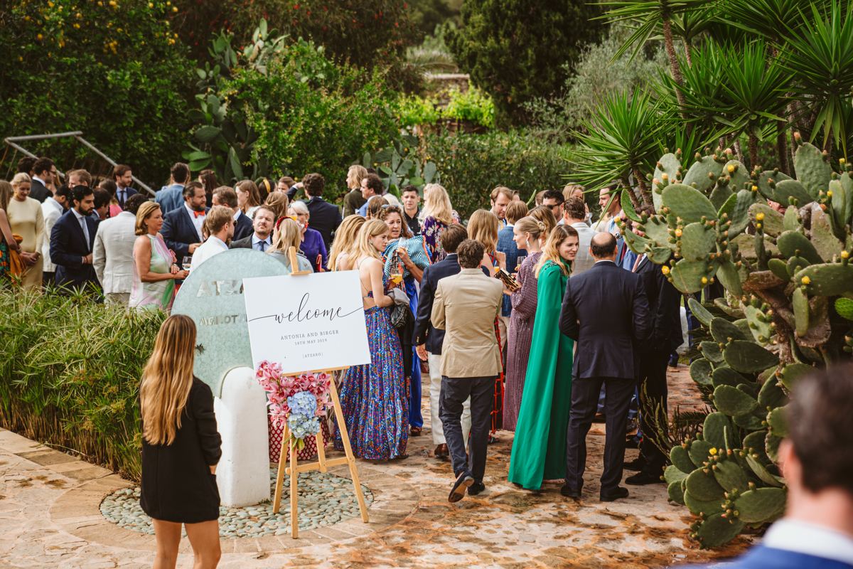 Go behind the scenes at Antonia & Birger's luxury, ultra-romantic Atzaro Ibiza wedding with a ceremony beside the water and epic party after dark.