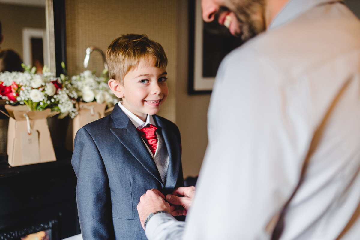 Page boy with red tie