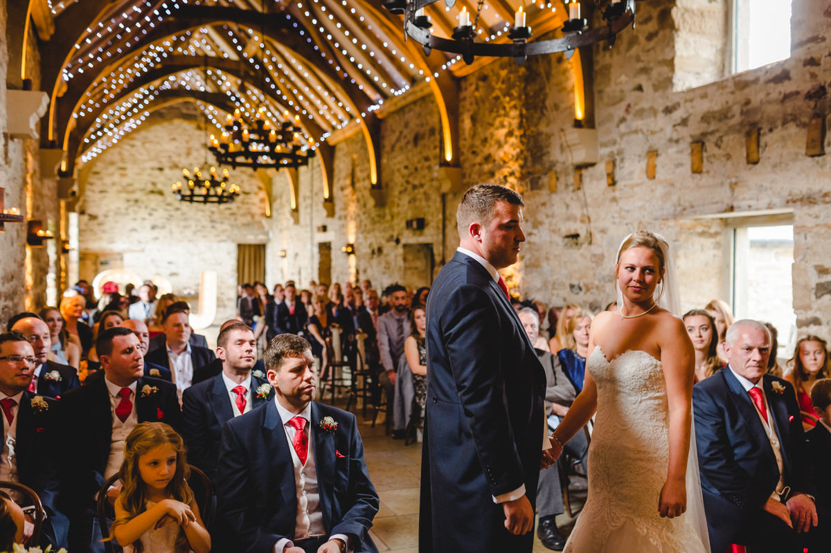 holding hands and exchanging vows