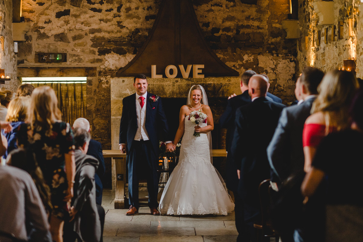 sonny and jo greet their guest as Mr and Mrs Webb