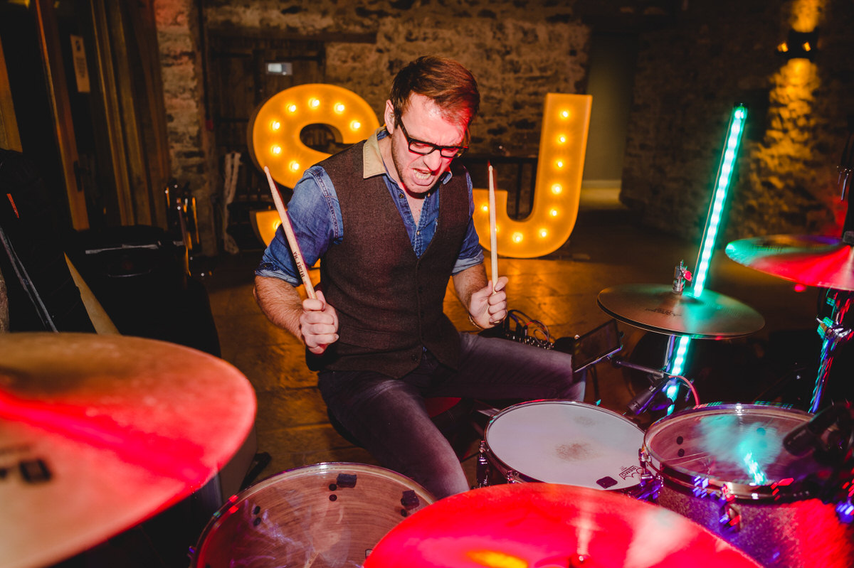drumsticks at the ready