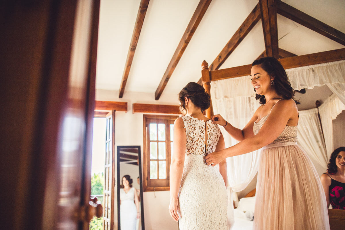 zipping up the dress