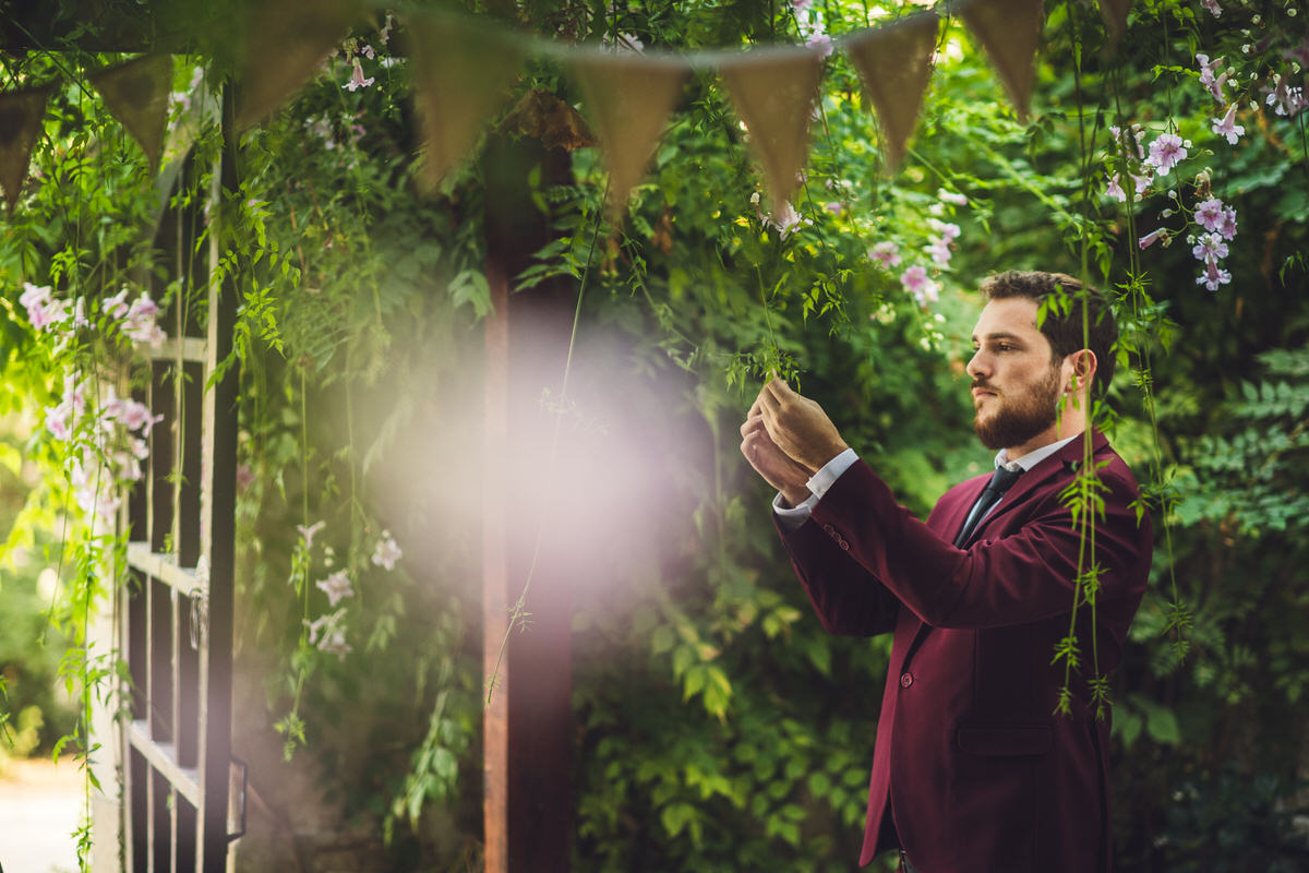 pensive groom awaits his bride