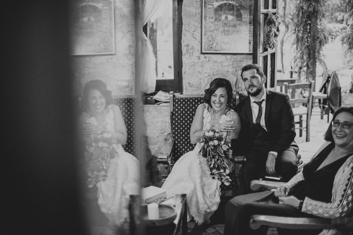 giggling bride with champagne