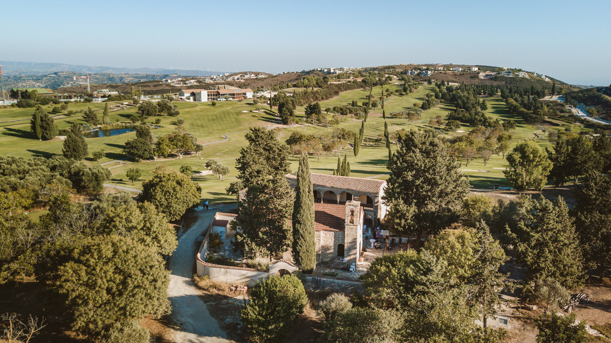 Discover how Ellie and Jack's ethereal, romantic Cyprus wedding unfolded, captured magically moment by moment by us, their Minthis Hills wedding photographer.