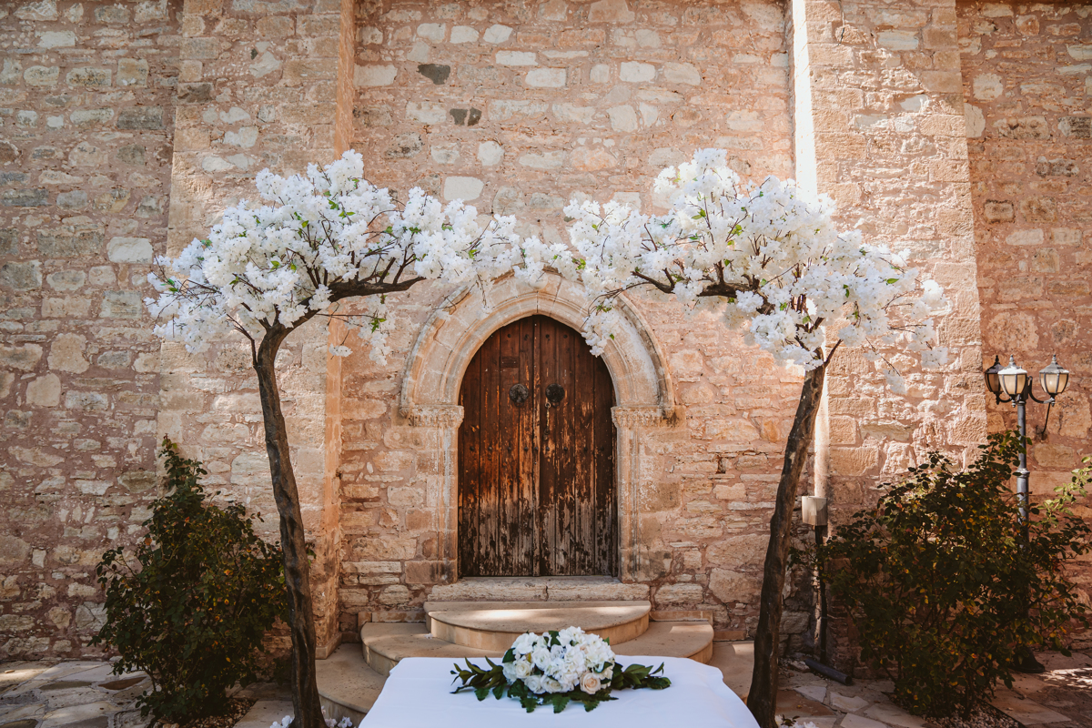 Discover how Ellie and Jack's ethereal, romantic Cyprus wedding unfolded, captured magically moment by moment by us, their Minthis Hills wedding photographer.