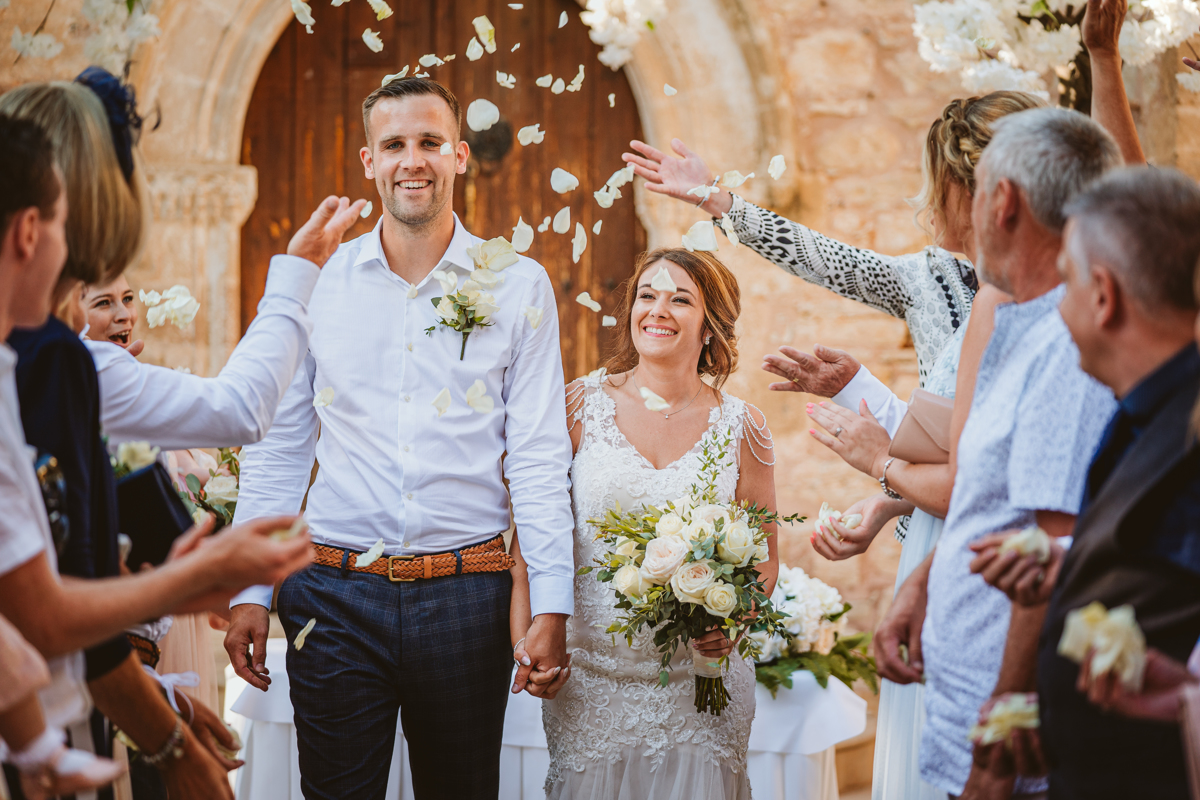 Discover how Ellie and Jack's ethereal, romantic Cyprus wedding unfolded, captured magically moment by moment by us, their Minthis Hills wedding photographer.