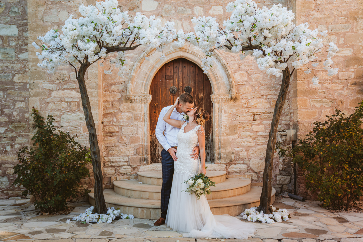 Discover how Ellie and Jack's ethereal, romantic Cyprus wedding unfolded, captured magically moment by moment by us, their Minthis Hills wedding photographer.