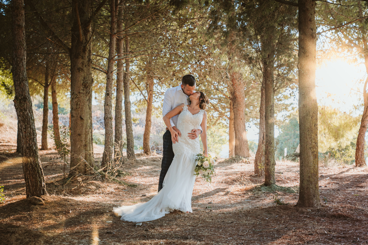 Discover how Ellie and Jack's ethereal, romantic Cyprus wedding unfolded, captured magically moment by moment by us, their Minthis Hills wedding photographer.