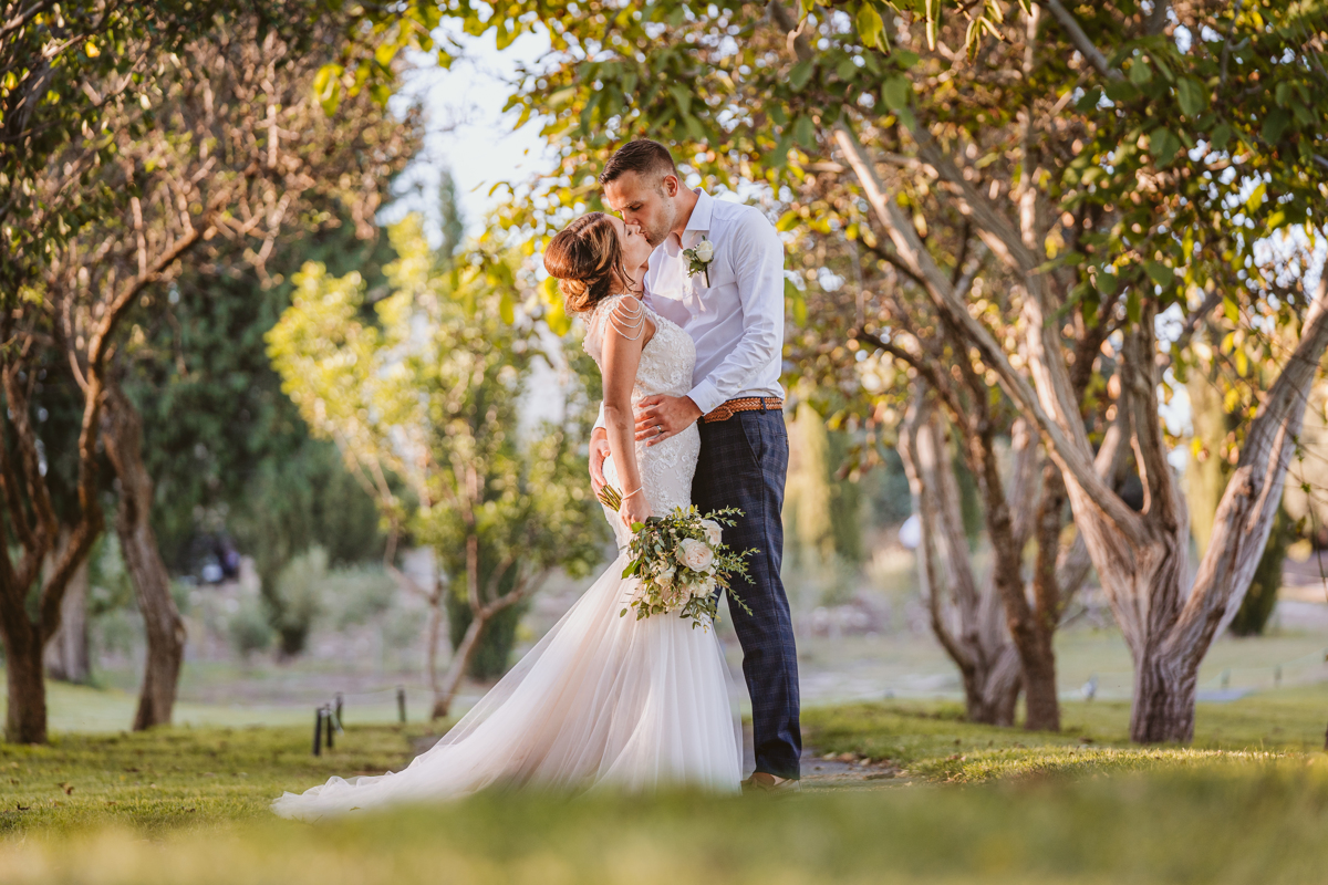 Discover how Ellie and Jack's ethereal, romantic Cyprus wedding unfolded, captured magically moment by moment by us, their Minthis Hills wedding photographer.