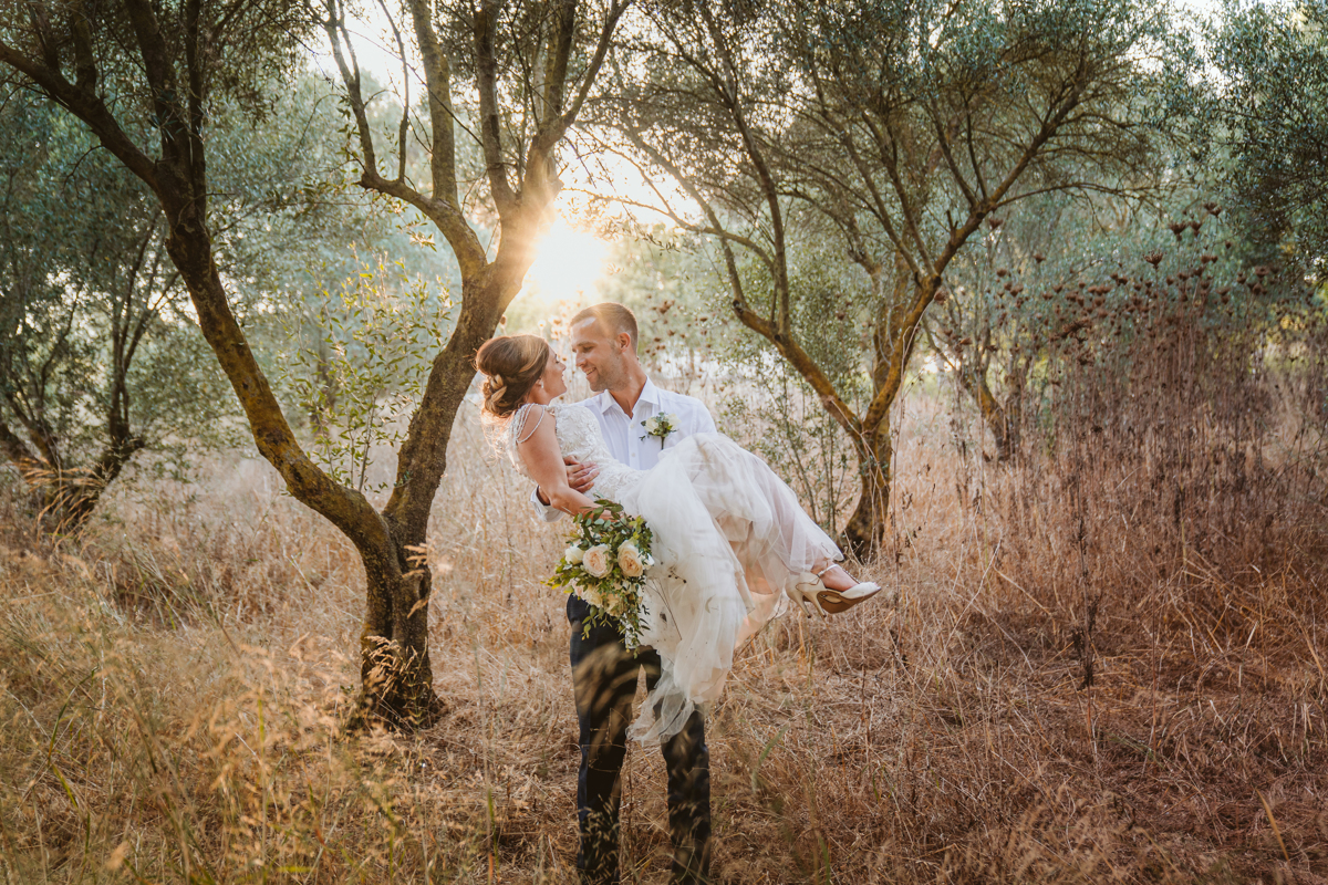 Discover how Ellie and Jack's ethereal, romantic Cyprus wedding unfolded, captured magically moment by moment by us, their Minthis Hills wedding photographer.