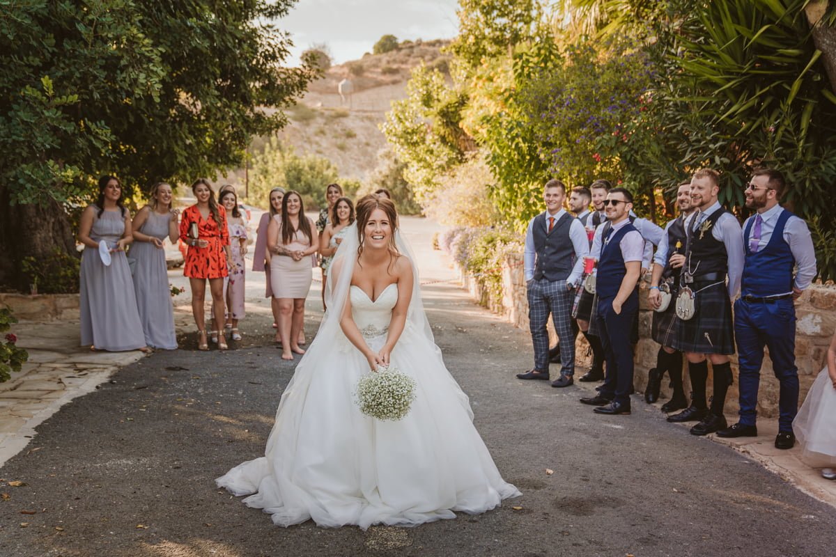 Get a behind-the-scenes look at Hannah and Keith's sun-kissed, laid-back wedding in Cyprus with Beziique, their epic Vasilias Cyprus wedding photographer.