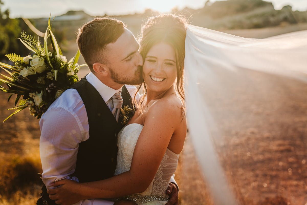 Get a behind-the-scenes look at Hannah and Keith's sun-kissed, laid-back wedding in Cyprus with Beziique, their epic Vasilias Cyprus wedding photographer.
