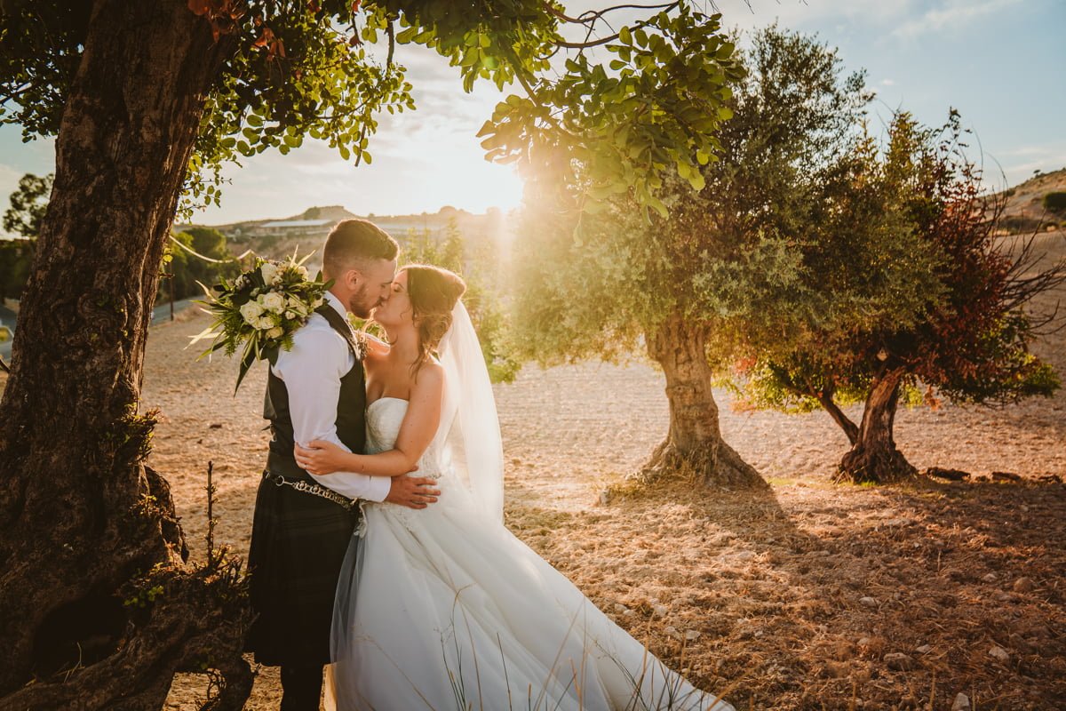 Get a behind-the-scenes look at Hannah and Keith's sun-kissed, laid-back wedding in Cyprus with Beziique, their epic Vasilias Cyprus wedding photographer.