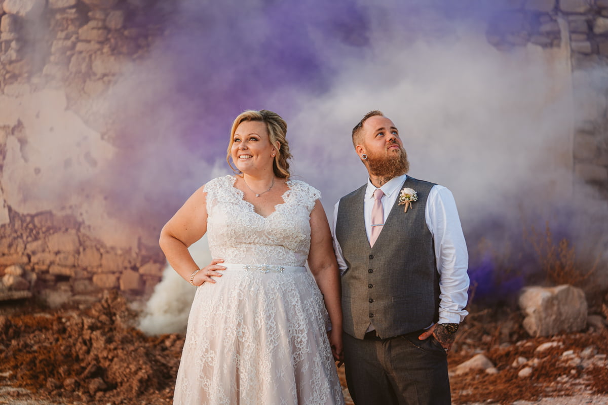 Fall feet first for Jess and Andy's Liopetro wedding in Cyprus, filled with sizzling sunsets and romantic smoke flares, captured by Kouklia wedding photographer