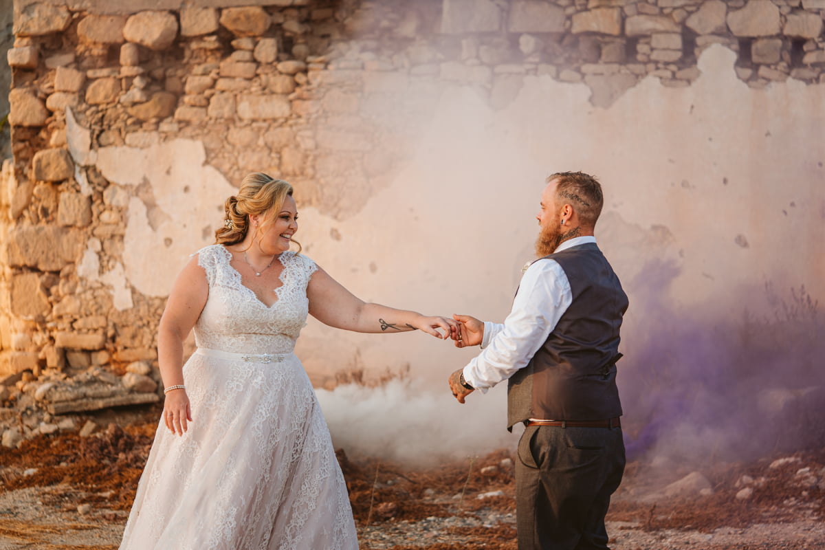 Fall feet first for Jess and Andy's Liopetro wedding in Cyprus, filled with sizzling sunsets and romantic smoke flares, captured by Kouklia wedding photographer