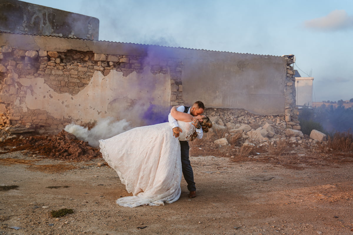 Fall feet first for Jess and Andy's Liopetro wedding in Cyprus, filled with sizzling sunsets and romantic smoke flares, captured by Kouklia wedding photographer