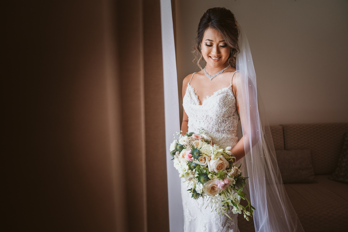 Glide behind the scenes of Kitty and Kevin's totally luxurious and romantic Aiya Napa wedding with us, their Olympic Lagoon wedding photographer.