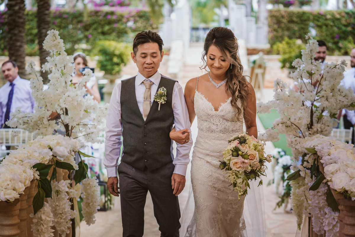 Glide behind the scenes of Kitty and Kevin's totally luxurious and romantic Aiya Napa wedding with us, their Olympic Lagoon wedding photographer.