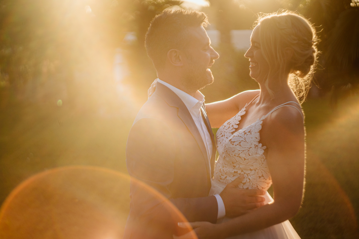 Can Gall Ibiza wedding photographer takes portrait of couple at sunset