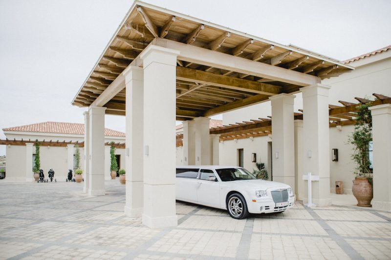 white limo outside venue